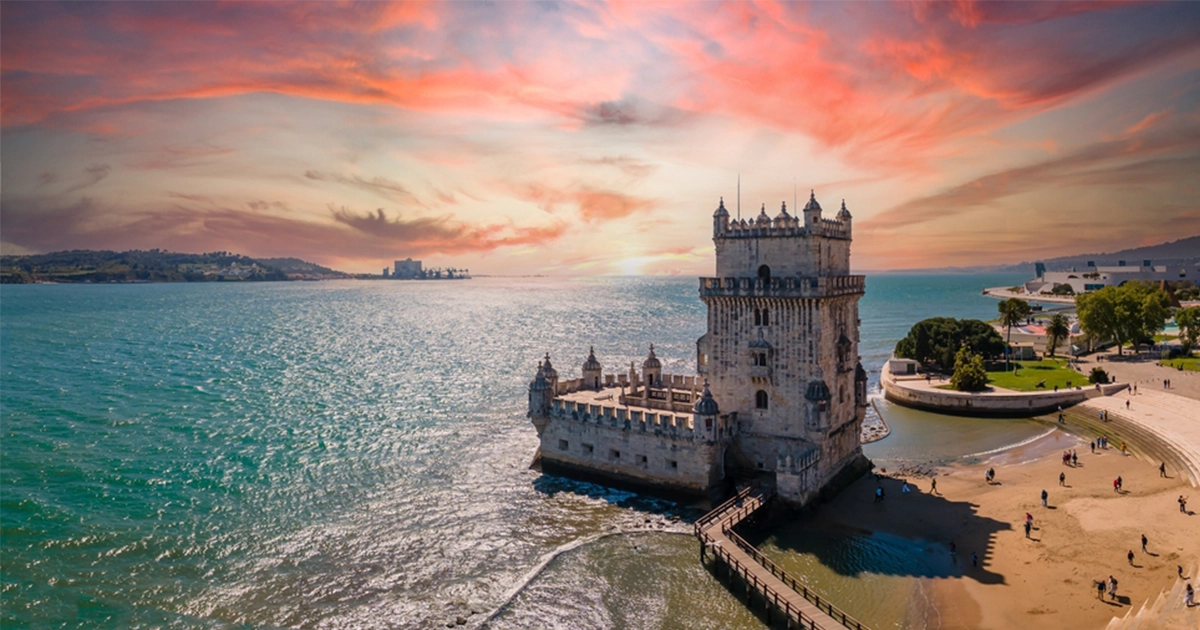 Aerial view of Tower of Belem at sunset, Lisbon, Portugal on the Tagus River.