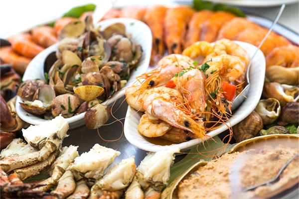 Mixed Grilled Seafood Platter with Shellfish, Shrimp, and Crab, Cooked by Cascais Restaurants, Portugal.