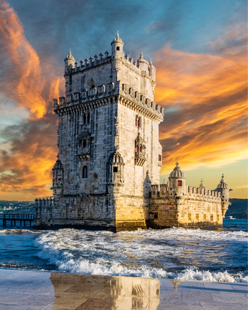 Vertical composition of sunset over Belem tower with reflection
